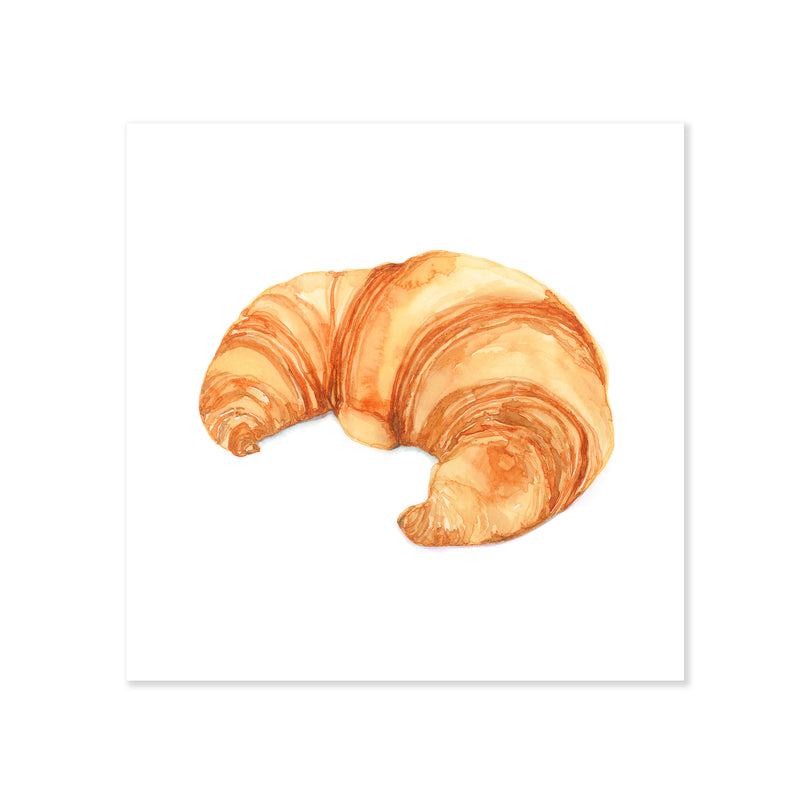 A fine art print illustrating a golden brown crescent shaped baked croissant pastry painted with watercolor on a soft white background